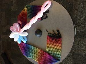 rainbow scarf and balloon sword